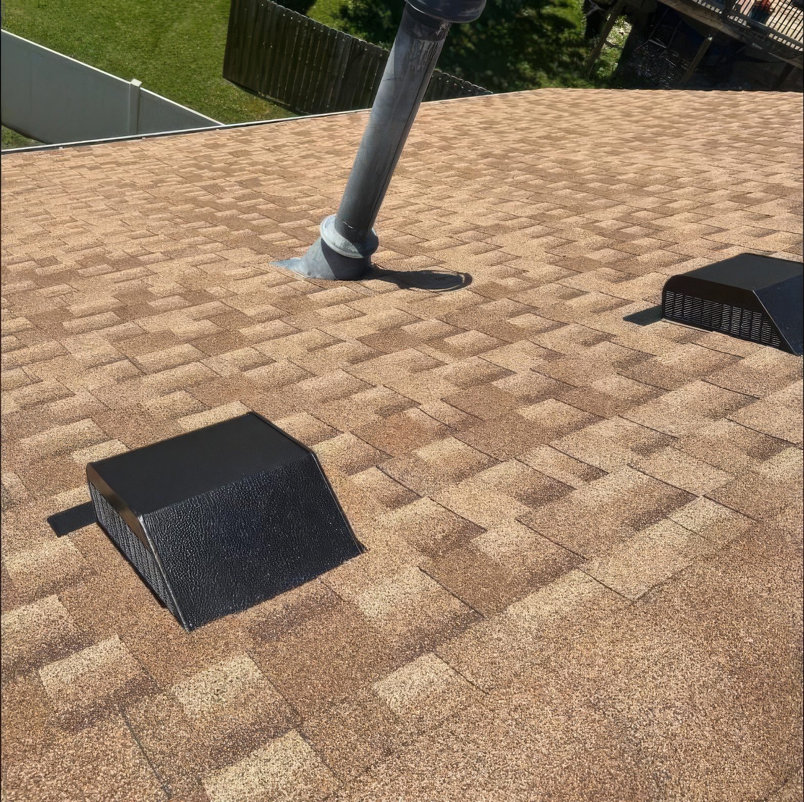 New shingles, a new box vent and a new flashed pipe